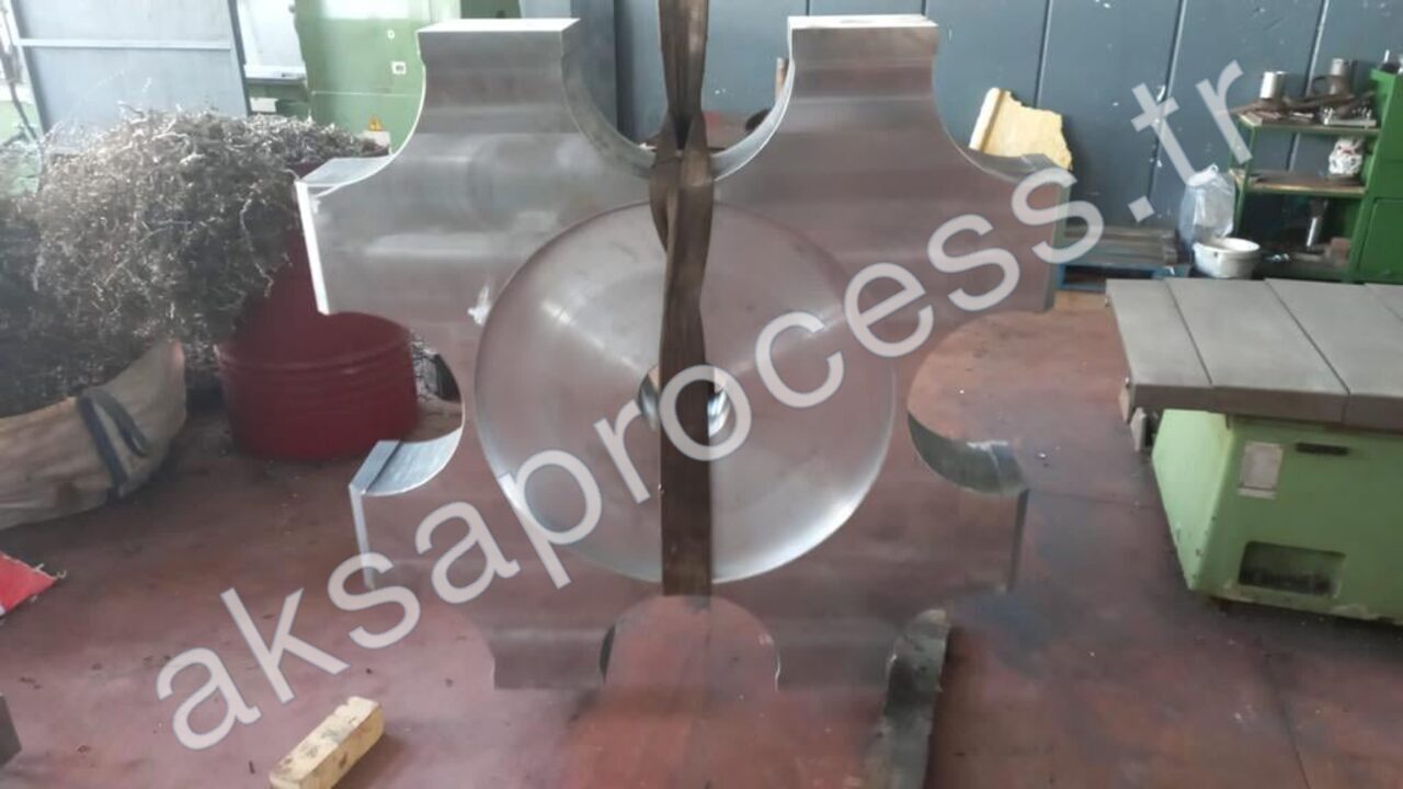 A large machined disc component for a pendulum mill on its assembly stand